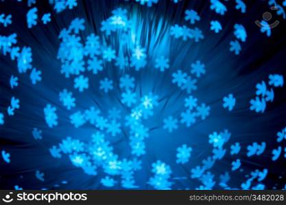 snowflakes shaped bokeh pattern - abstract winter background