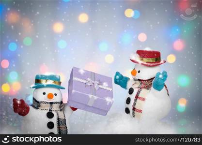 Snowman and giftboxes in the snowfall background, AF point selection and make snowflake.