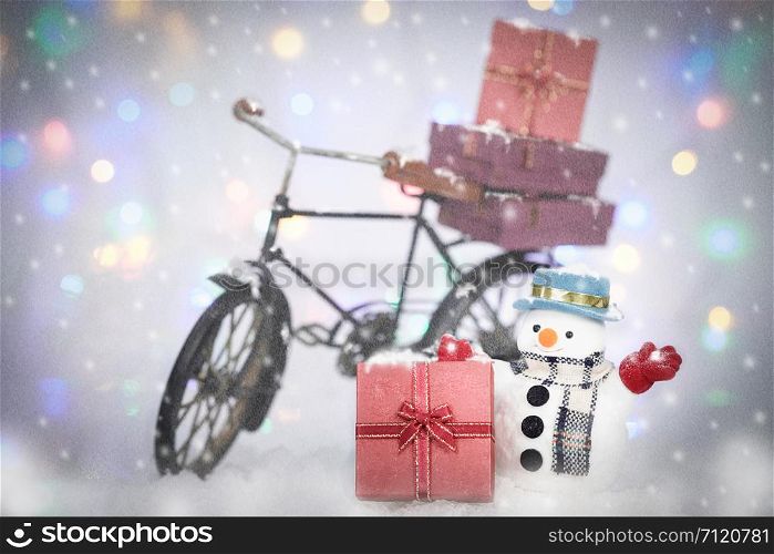 Snowman Cycling in the snowfall background, AF point selection and make snowflake.