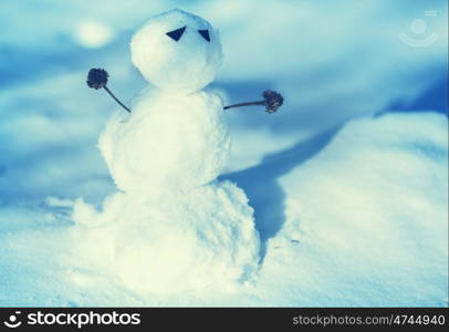 Snowman in winter background