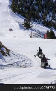 Snowmobile on ski slope in Andorra