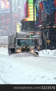 Snowplow on City Street