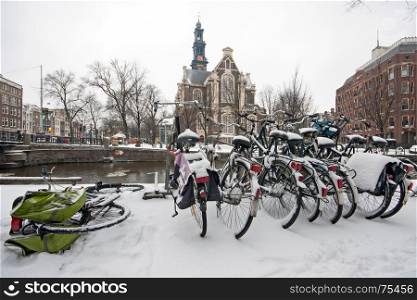 Snowy Amsterdam with the Westerkerk in the Netherlands in winter