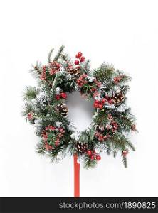 snowy festive wreath on white background. Resolution and high quality beautiful photo. snowy festive wreath on white background. High quality and resolution beautiful photo concept