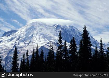 Snowy Mountain Peak Capped by Cloud