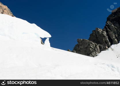 Snowy mountains. Mountain landscape with snow and clear blue sky