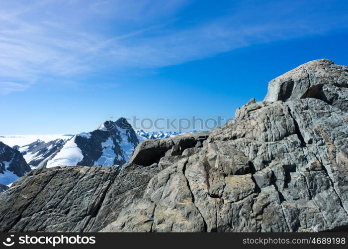 Snowy mountains. Mountain landscape with snow and clear blue sky