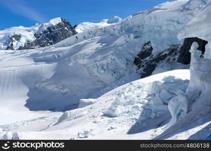 Snowy mountains. Mountain landscape with snow and clear blue sky