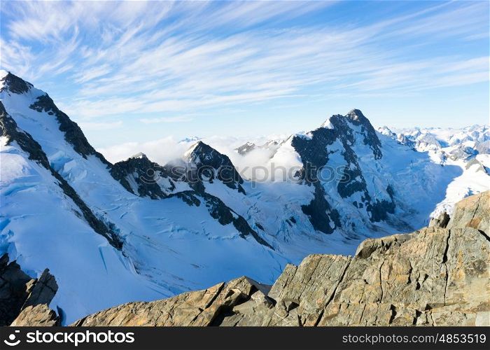 Snowy mountains. Mountain landscape with snow and clear blue sky