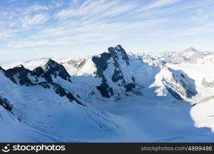 Snowy mountains. Mountain landscape with snow and clear blue sky