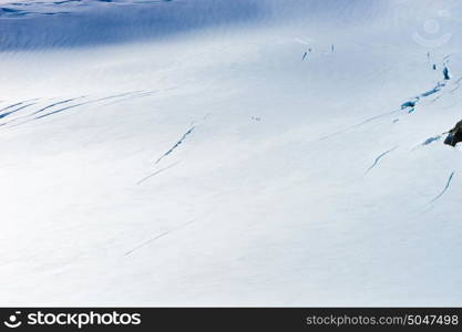 Snowy mountains. Mountain landscape with snow and clear blue sky