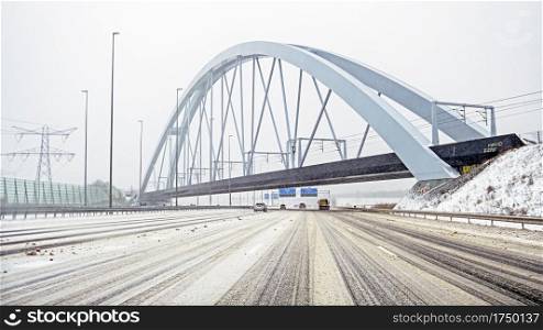 Snowy Zandhazen bridge near Muiderberg in the Netherlands in winter