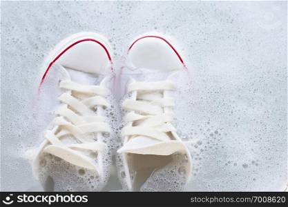 Soak shoes before washing. Cleaning Dirty sneakers.