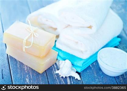 Soap and Body Lotion on the Wooden Background