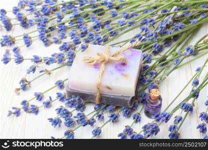 Soap with lavender on wooden table