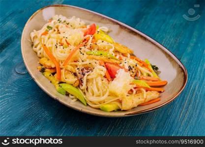Soba with vegetables in soy sauce with spices