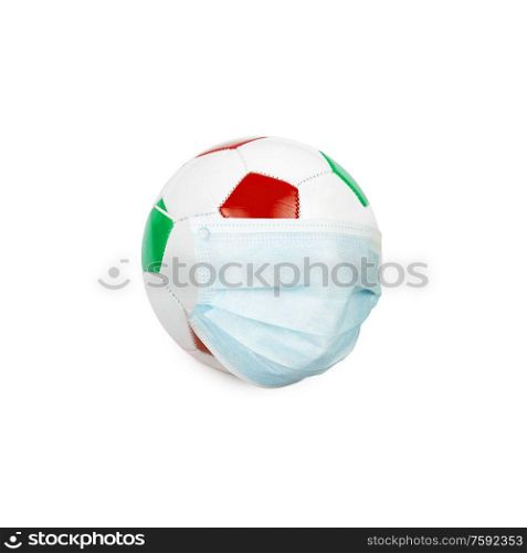 Soccer ball in italian colors with mask isolated on a white background. Virus threatened championship concept. Virus in footbal