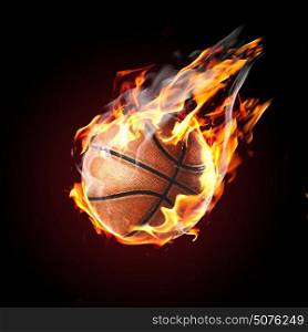 Soccer ball on fire flying on black background. Soccer ball on fire