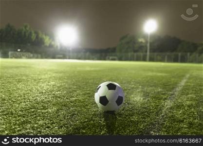 Soccer ball on sports field