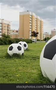 soccer balls on the cityscape