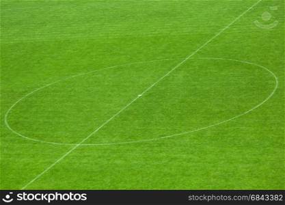 Soccer field center and ball top view background