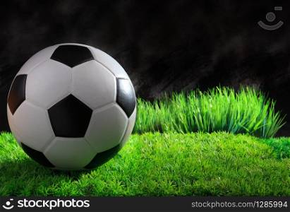soccer football sport equipment on green grass field use for sport background and related topic. soccer football sport equipment on green grass field