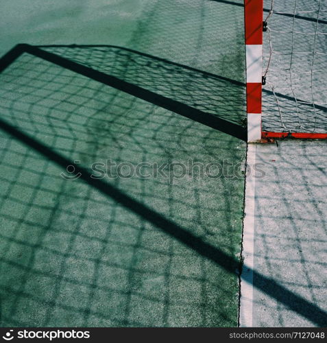 soccer goal sports equipment shadow silhouette in the fiel on the street