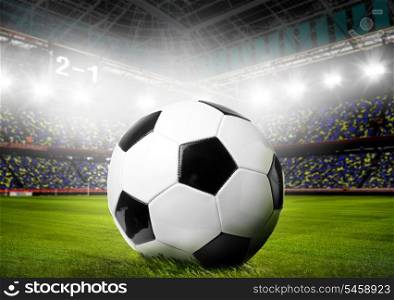 soccer or football ball on stadium