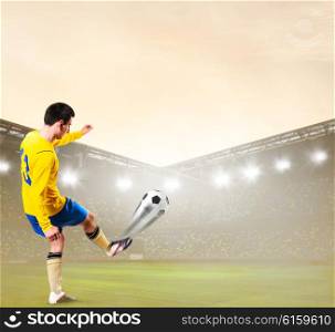 soccer or football player is kicking ball on stadium. soccer or football player
