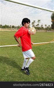 Soccer Player Juggling the Ball