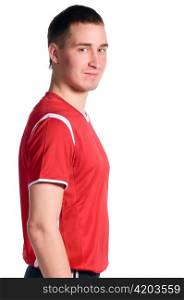 soccer player looking at camera, side view isolated on white