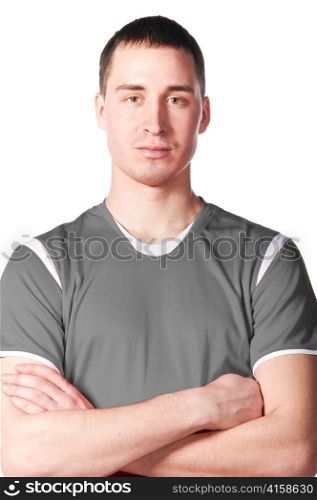 soccer player with folded hands, cut out from white