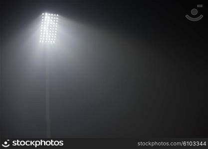 soccer stadium lights reflectors against black background