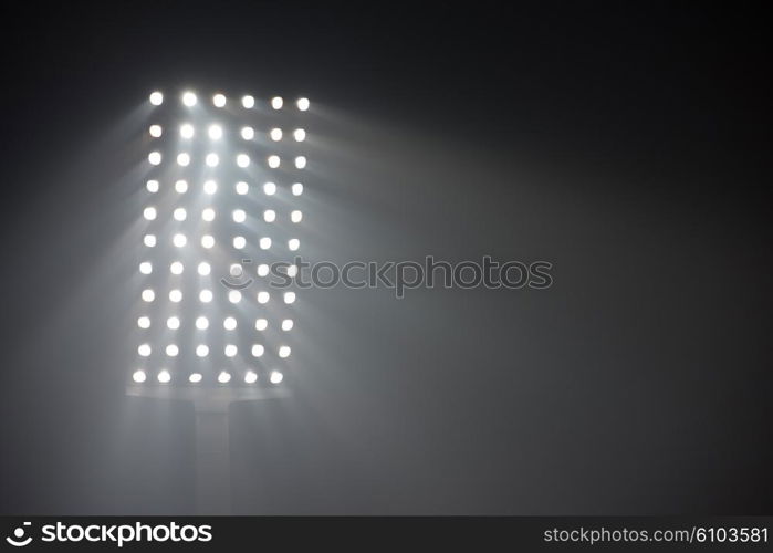 soccer stadium lights reflectors against black background