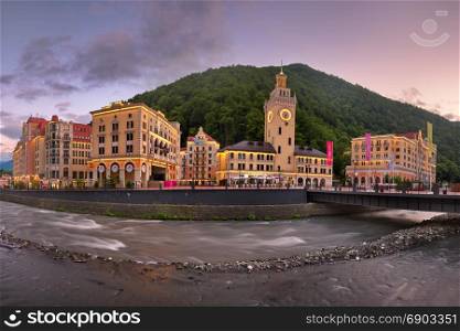SOCHI, RUSSIA - JUNE 22, 2017: Romanov Bridge and Mzymta River in the Morning, Rosa Khutor, Sochi, Russia. Rosa Khutor constructed from 2003 to 2011 and hosted the alpine skiing events for the 2014 Winter Olympics.