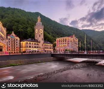 SOCHI, RUSSIA - JUNE 22, 2017: Romanov Bridge and Mzymta River in the Morning, Rosa Khutor, Sochi, Russia. Rosa Khutor constructed from 2003 to 2011 and hosted the alpine skiing events for the 2014 Winter Olympics.