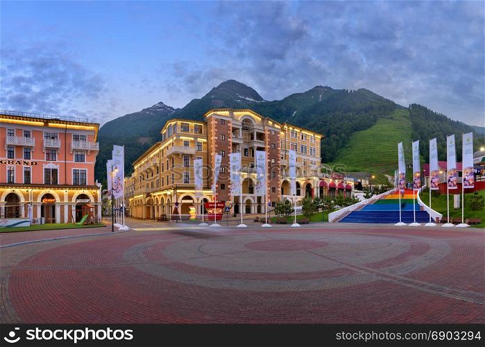 SOCHI, RUSSIA - JUNE 23, 2017: Panorama of Sberbank Square in the Evening, Gorky Gorod, Sochi, Russia. Gorky Gorod hosted media events for the 2014 Winter Olympics.