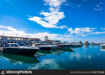 Sochi, Russia - September 29, 2016: Racing yacht in the port of Sochi. Marine station - station complex Port of Sochi.