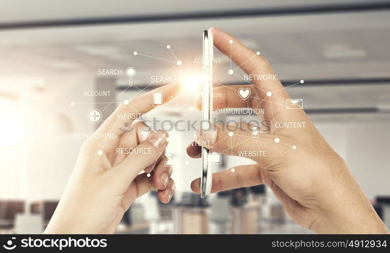 Social media and cloud computing. Smartphone in hand and cloud computing user interface