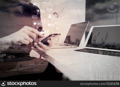 Social media and Marketing virtual icons screen concept.businessman working with smart phone and digital tablet and laptop computer and document in modern office with London city exposure