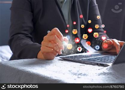 Social media and online digital concepts Coming out as a hologram icon : Concept holiday living and social media social distancing, working from home.