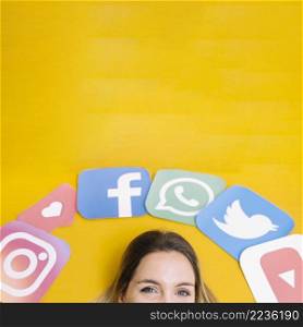 social media application icons woman s head yellow backdrop