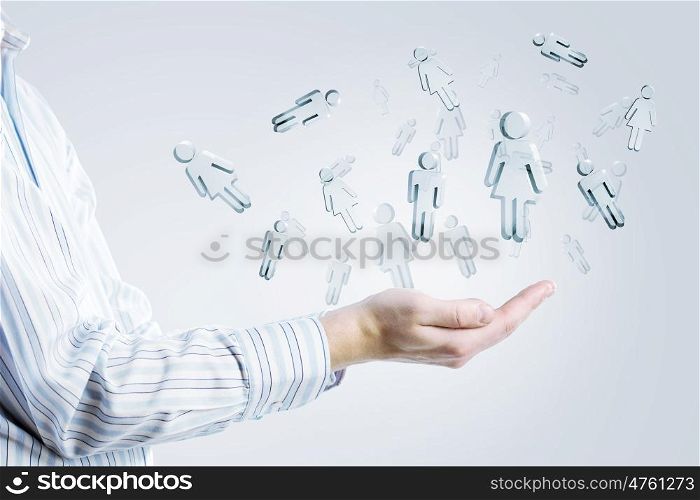 Social net concept. Businessman holding modern social buttons in palm