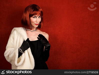 Socialite with brassy red hair