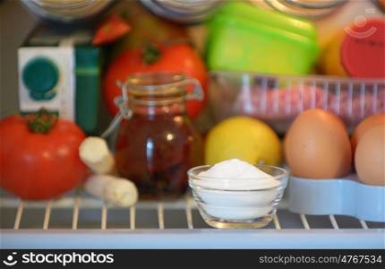 sodium bicarbonate inside of fridge, closeup