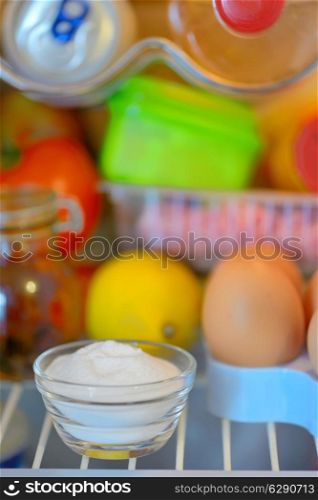 sodium bicarbonate inside of fridge, closeup
