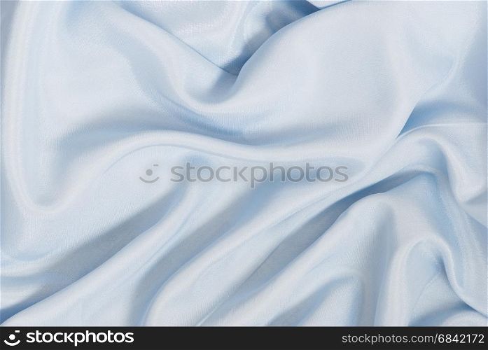 Soft blue satin wavy background