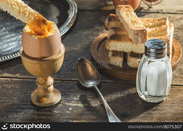 Soft-boiled egg on the table. Boiled egg on breakfast