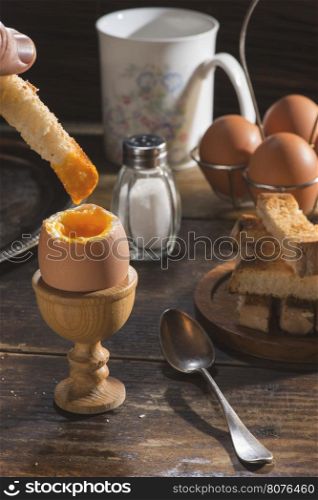 Soft-boiled egg on the table. Boiled egg on breakfast