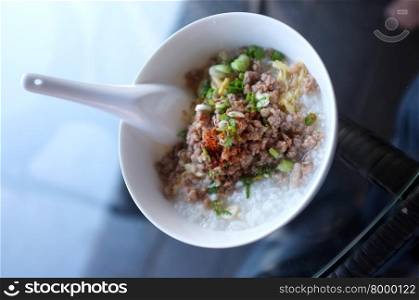 Soft boiled rice with mince pork, Congee
